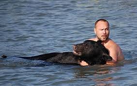 Adam Warwick with Bear