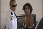 Bryan Zuniga with police after alligator attack