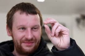 James Humphries holding pearl