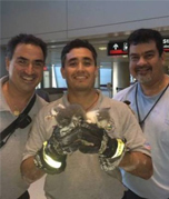 Airport Personnel with Kittens at Airport