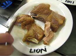 Lion meat being served