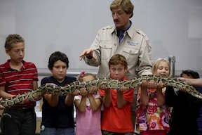 Peter Gros Showing Python to Children