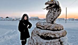 Snake sculpture made from cow dung