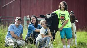 Tracey and Jon Stewart with children and animals