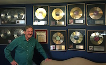 Terry Woodford with Platinum and Gold Records