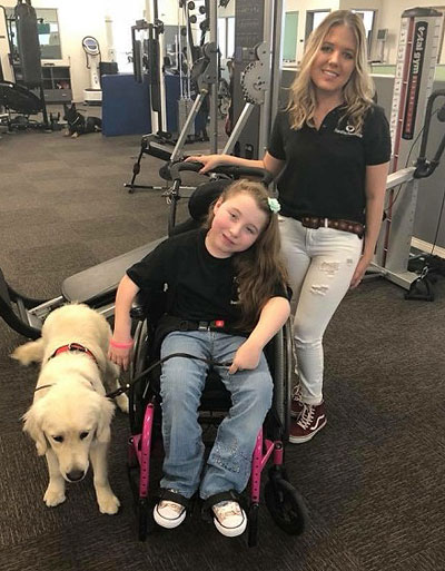 Tabitha Bell with Girl in Wheelchair